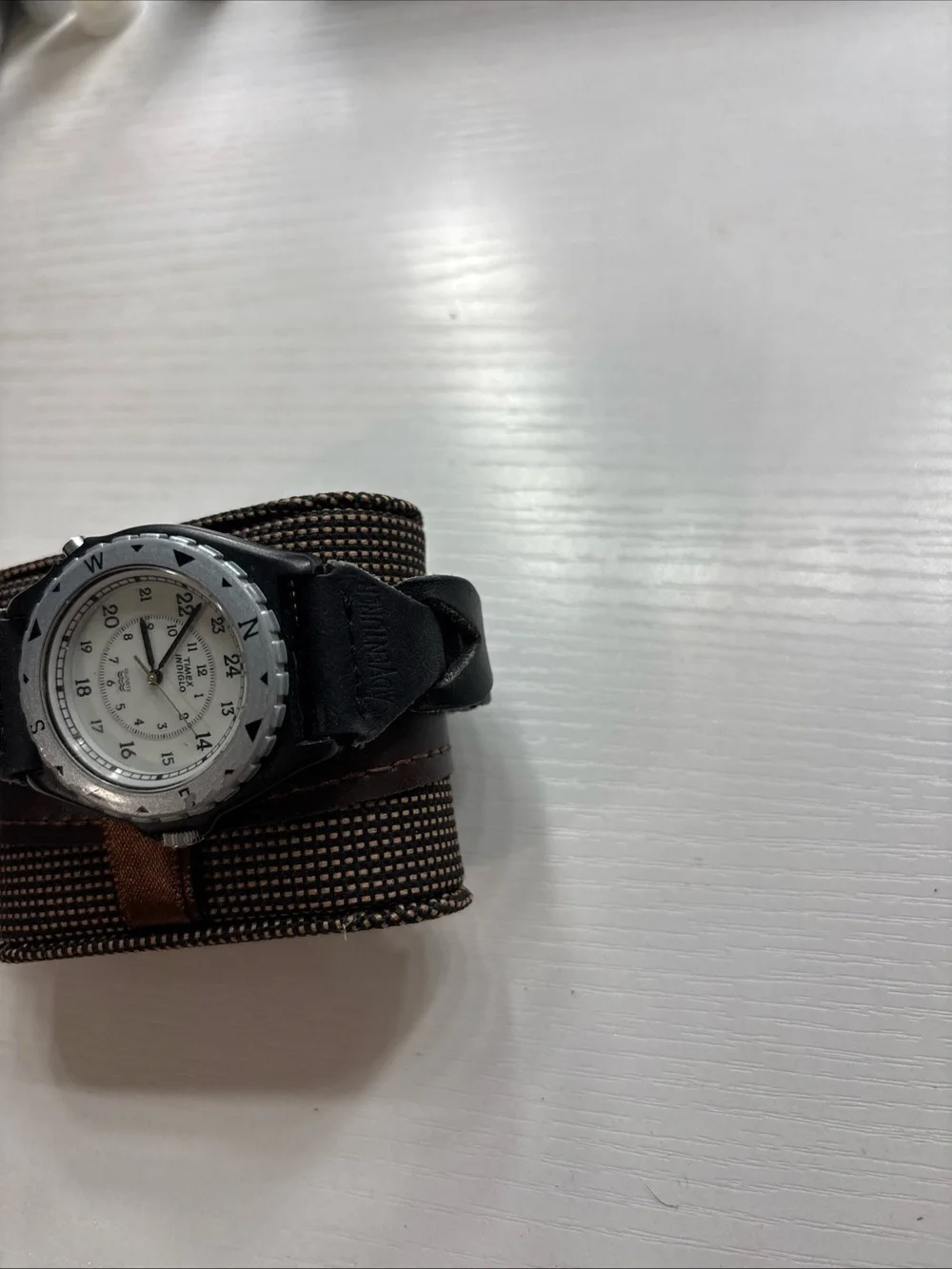 Timex Black Strap Watch with White Dial and Compass Bezel